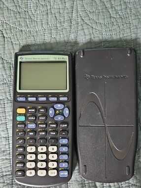 Texas Instruments TI-83 Plus Graphing Calculator - Black with Light Gray Buttons